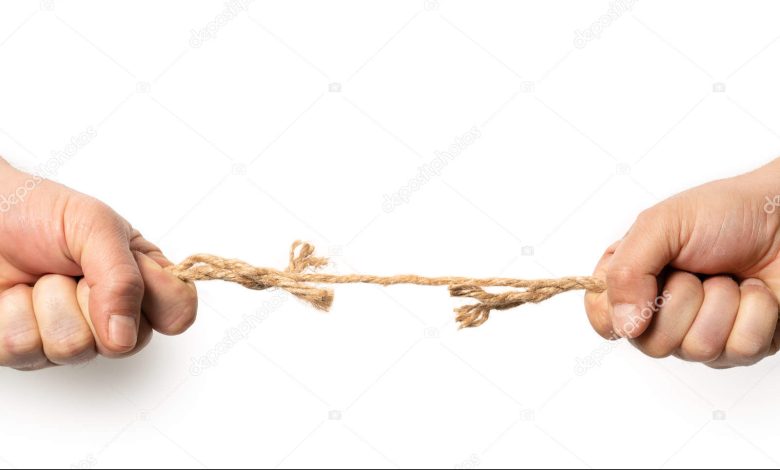 depositphotos 345369458 stock photo two man are pulling old